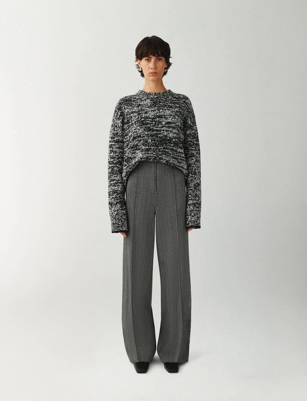 The Frequency Sweater In Marled Merino in Black + White
