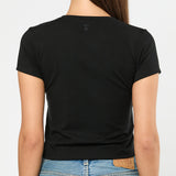 Person wearing a black t-shirt and blue jeans on a white background