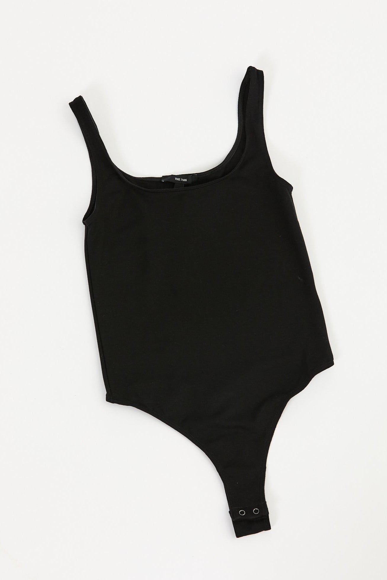 Black bodysuit on a white background