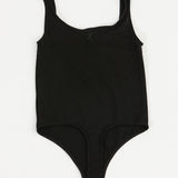 Black bodysuit on a white background