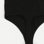 Black bodysuit on a white background
