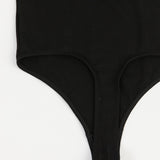 Black bodysuit on a white background