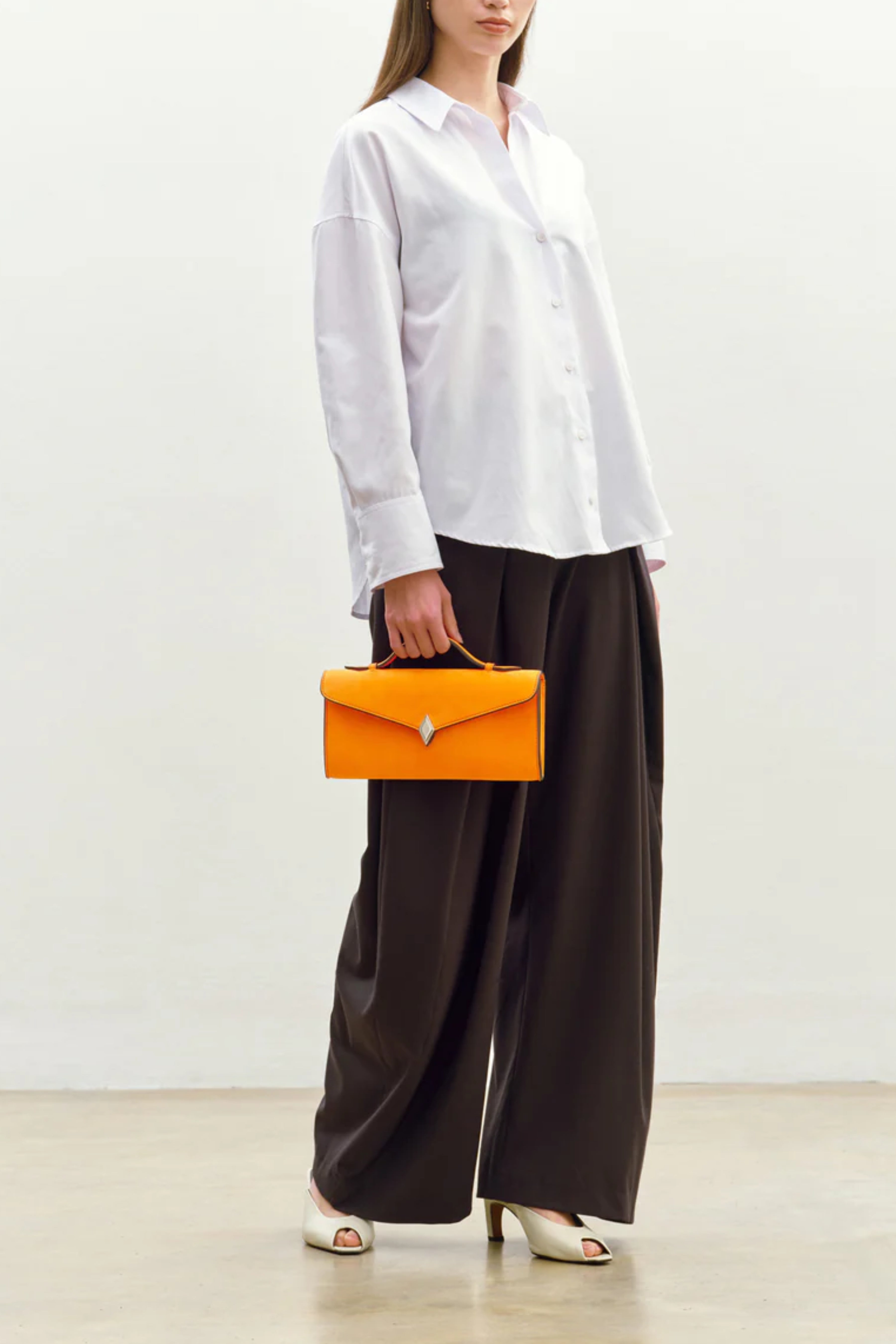 Edge Clutch in Tangerine