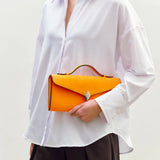 Edge Clutch in Tangerine
